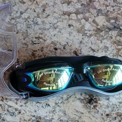 Aegend swim goggles. 
The lenses have an anti-fog and UV protective coating. 
They are designed with a soft and flexible silicone gasket for comfort a