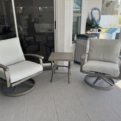 Two Outdoor chairs with table