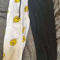 half smiley face half black sweatpants 