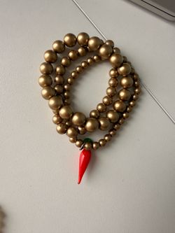 Bracelet with a chili pepper charm
