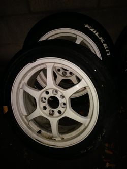 PAIR of buddy club reps. With falken tires