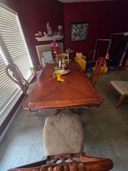Dinning table w/4 chairs and china