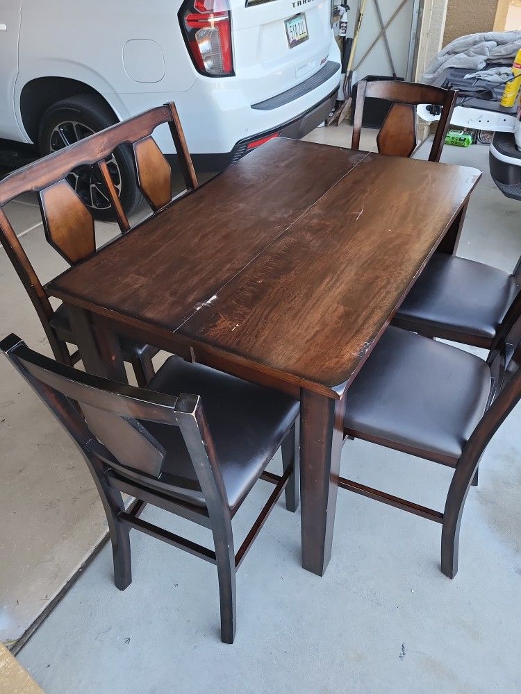 Table 4 Chairs and a bench $100.00