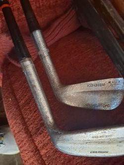 Two vintage golf clubs,functional ,collectable.