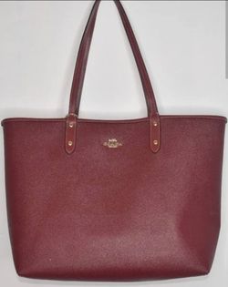 Coach Reversible City Tote in burgundy / signature canvas with party animal print