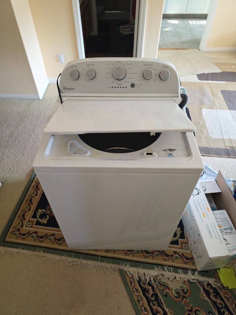 Washer Whirlpool. Works Fine Except Leaves White Detergent Stain Due To Build Up