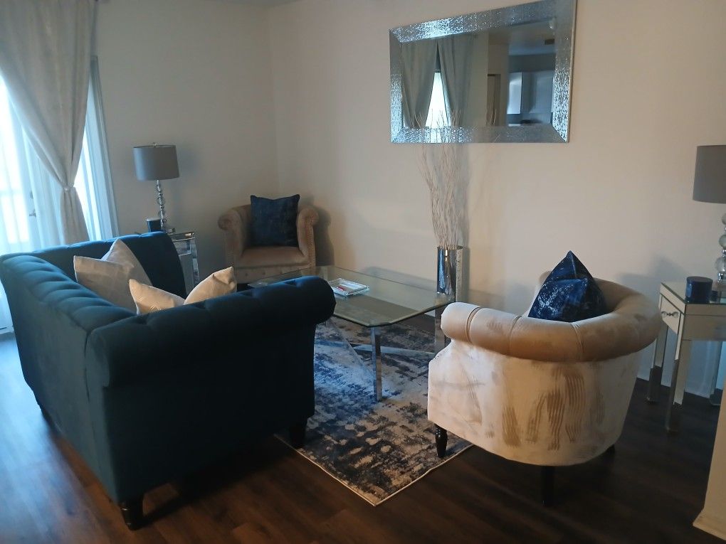 Living room Sofa and 2 acid chairs.
