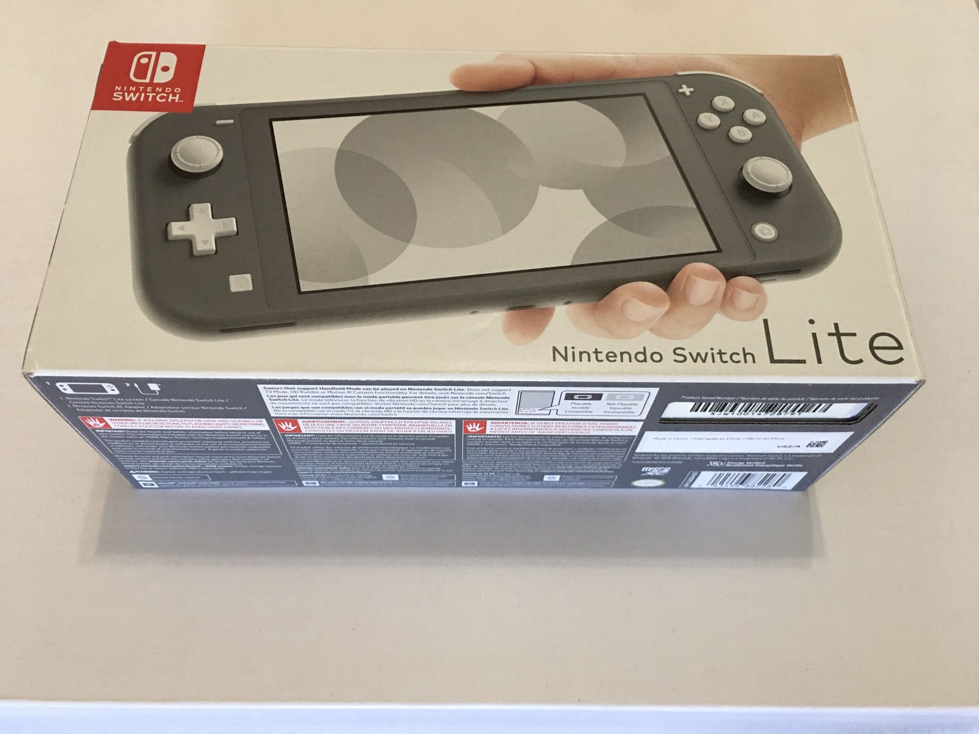 Nintendo Switch Lite- Gray 32 GB, New and never removed from Box !!