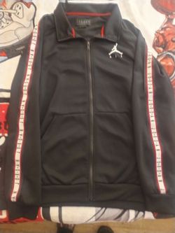 Jordans Black and white jacket size XL us