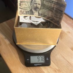 Heavy box of Coins And Paper Money