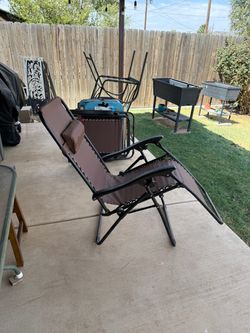 Two outdoor folding chairs