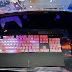 Corsair K70 RGB PRO keyboard and Glorious Model D wireless mouse.