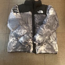 the north face supreme puffer 