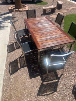 Patio set stainless steel 2 tables and 6 chairs and 2 sun beds