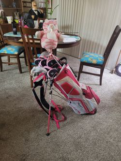 Beautiful woman's Cobra full Fly Z XL set of golf clubs