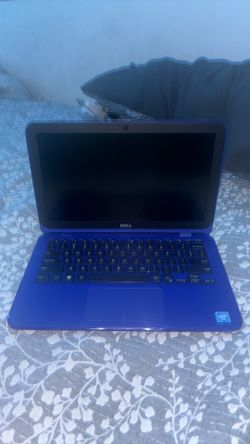 Dell blue Inspiron laptop