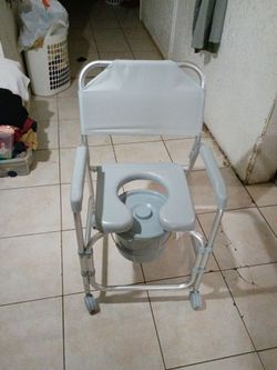 Raised toilet seat with arm bedside commode chair for seniors