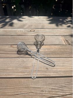 Handy set of two vintage metal whisks