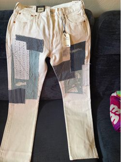 White with blue patches Levi jeans size 30/32