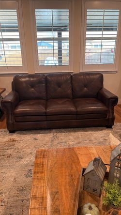 Free brown leather sofa and love seat