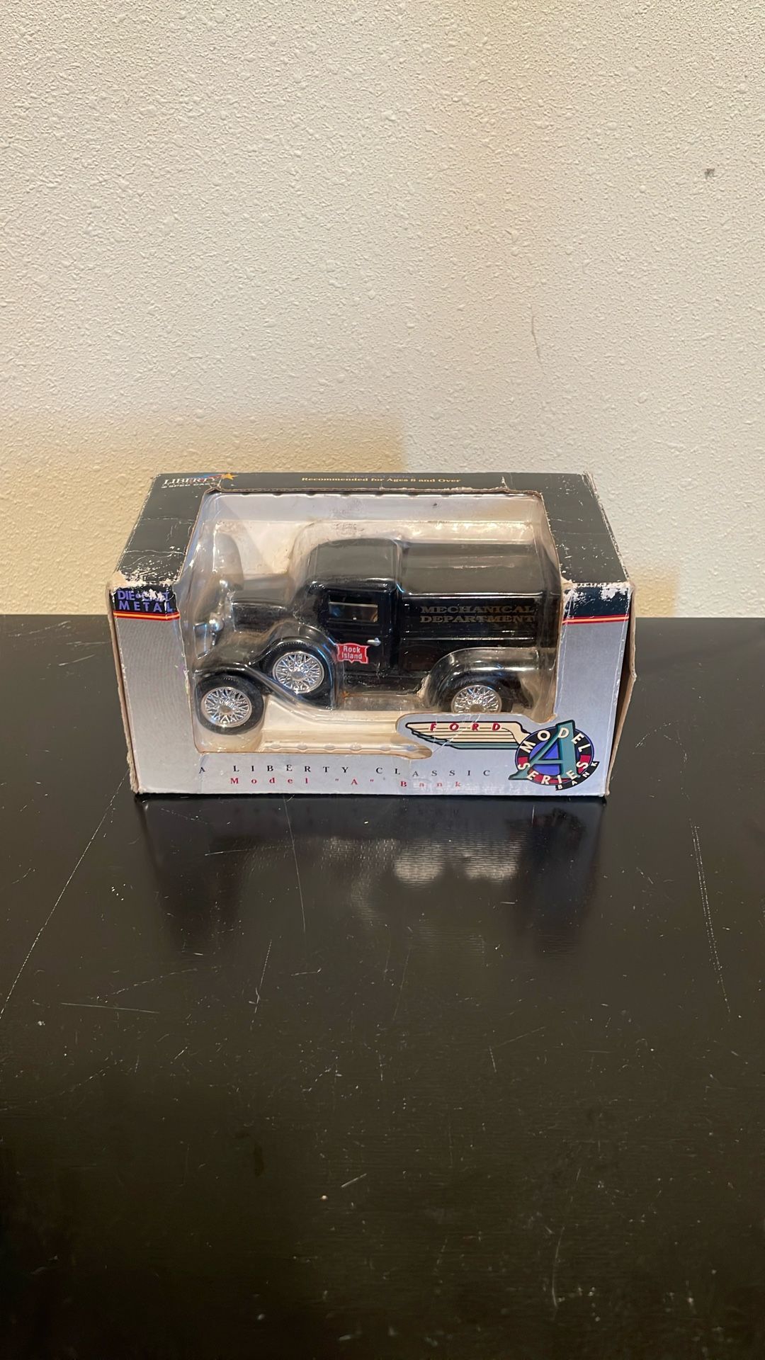Mechanical Department Ford Model Series Bank Diecast Truck.