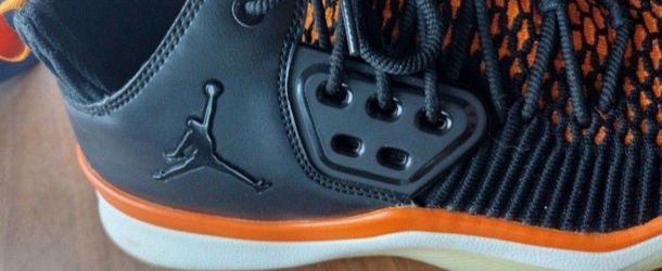 Air Jordan Black and Orange Sneakers size 10.5