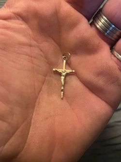Gold cross pendant