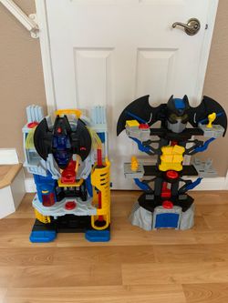 Two Batman caves toys