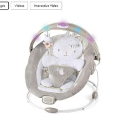 InLighten by Ingenuity Twinkle Tails Vibrating Infant Baby Bouncer with Lightning Toy Bar and Pillow