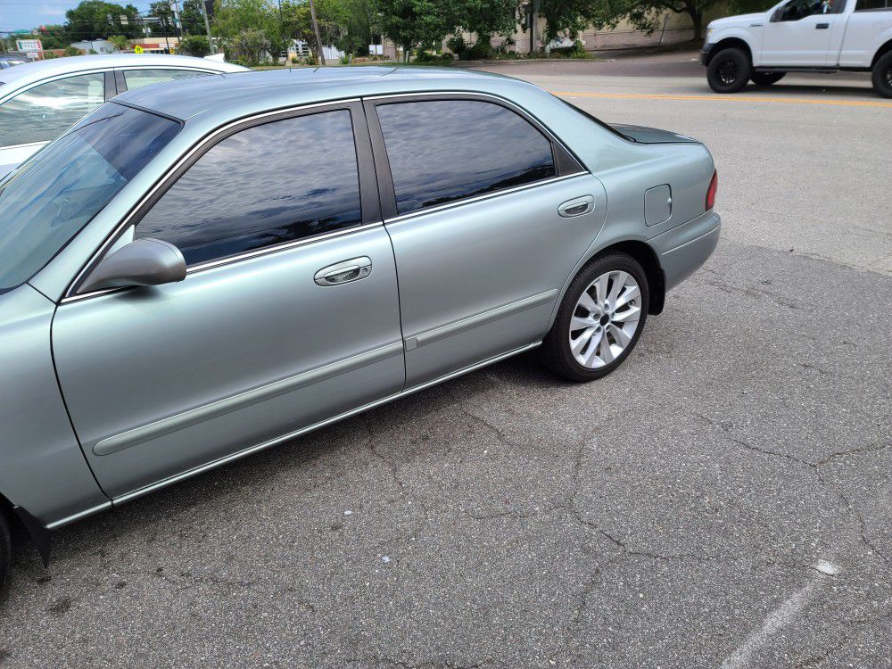 Photo 1999 MAZDA 626 LX WITH SUPER LOW MILES