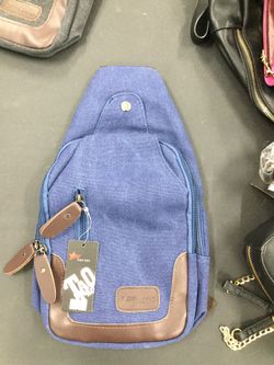 Tao Tao vertical sling crossbody travel shoulder bag backpack canvas blue