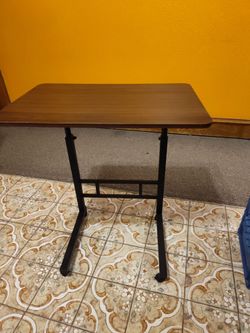 Walnut adjustable laptop desk black frame excellent condition brand new asking $33 measurements are 24x16 with 26 height