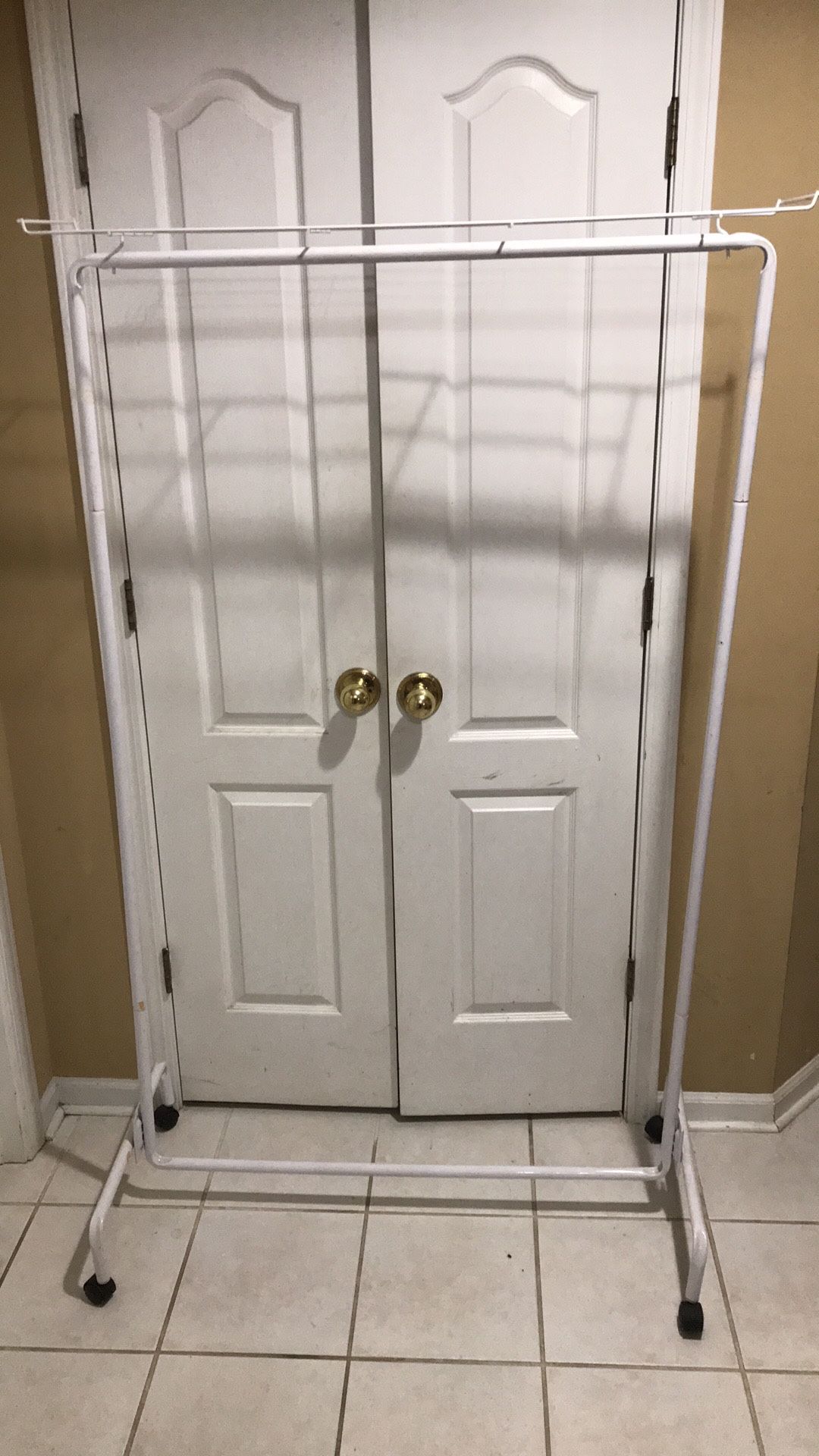 Metal Clothing Racks On Wheels - $10 Each