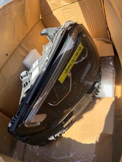 Brand new headlight c300 Benz