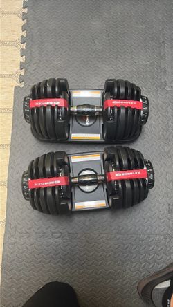 Pair of bow flex selecttech 50lb dumbbells