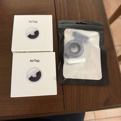 Set Of 2 Apple AirTags And Cases