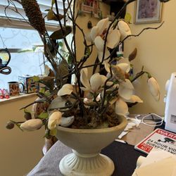 Pretty Stone Planter With Silk Orchids In It.