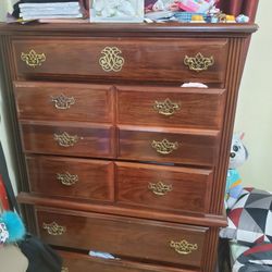 2 beds and a dresser