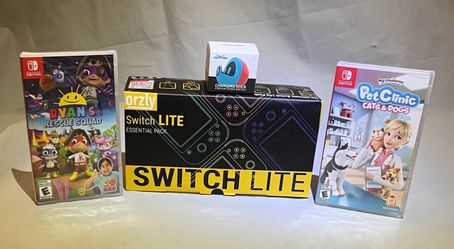 Nintendo Switch Essential Pack W/ 2 Games + Charging Dock