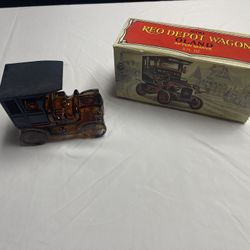 Vintage Avon Products, Inc. 1906 Reo Depot Wagon brown glass after shave decanter. 