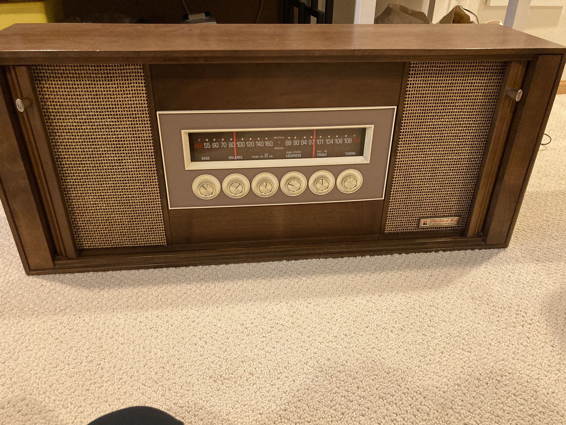 Vintage Packard Bell Stereophonic Radio/Stereo 1960s cabinet, stereo works. 35”x9”x15”.