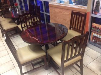 Table and four chairs brand-new