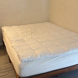 Queen bed frame with mattress and topper ($850 value)