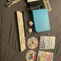Wii System With Accessories Vibrators For Remotes A Wireless Bar And A Few Games 