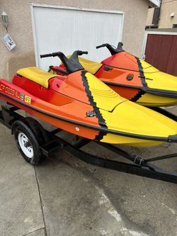 2 Running Jet Skis And Trailer