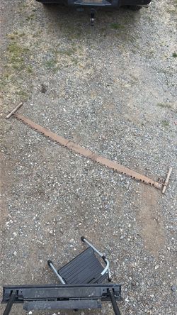 7 ft vintage two-man crosscut logging saw with wooden handles
