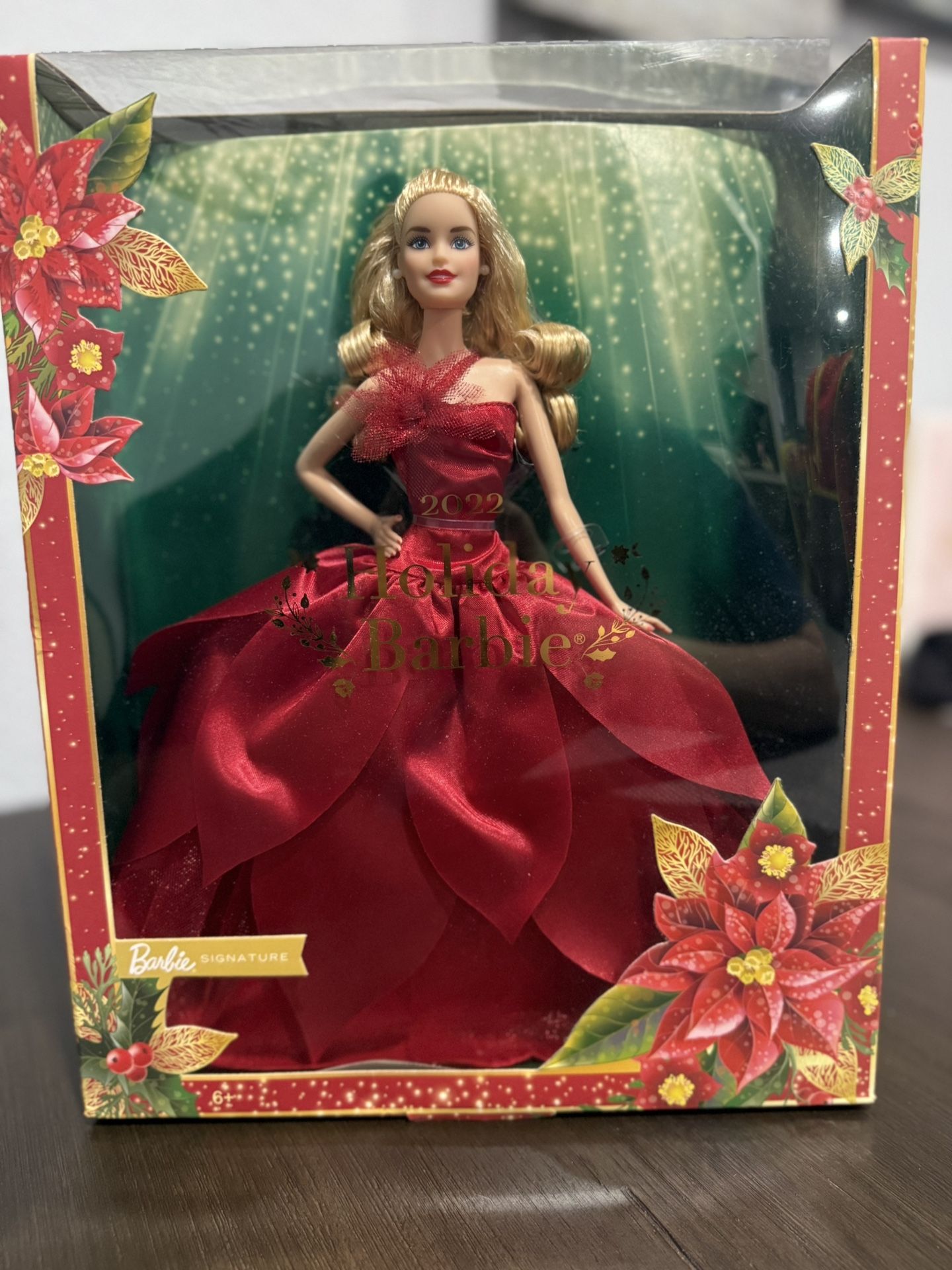Barbie Signature 2022 Holiday Doll, Blonde Wavy Hair Wearing Red Poinsettia-Inspired Gown,