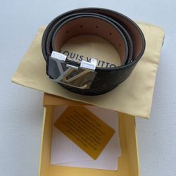 Black and silver LV belt