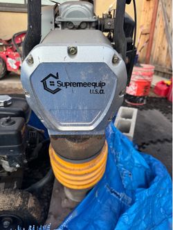 Jumping jack soil compactor