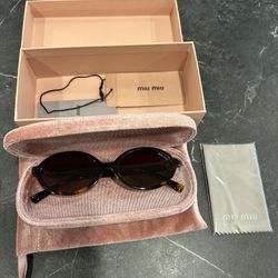 Miu Miu Oval Brown Tortoise Sunglasses